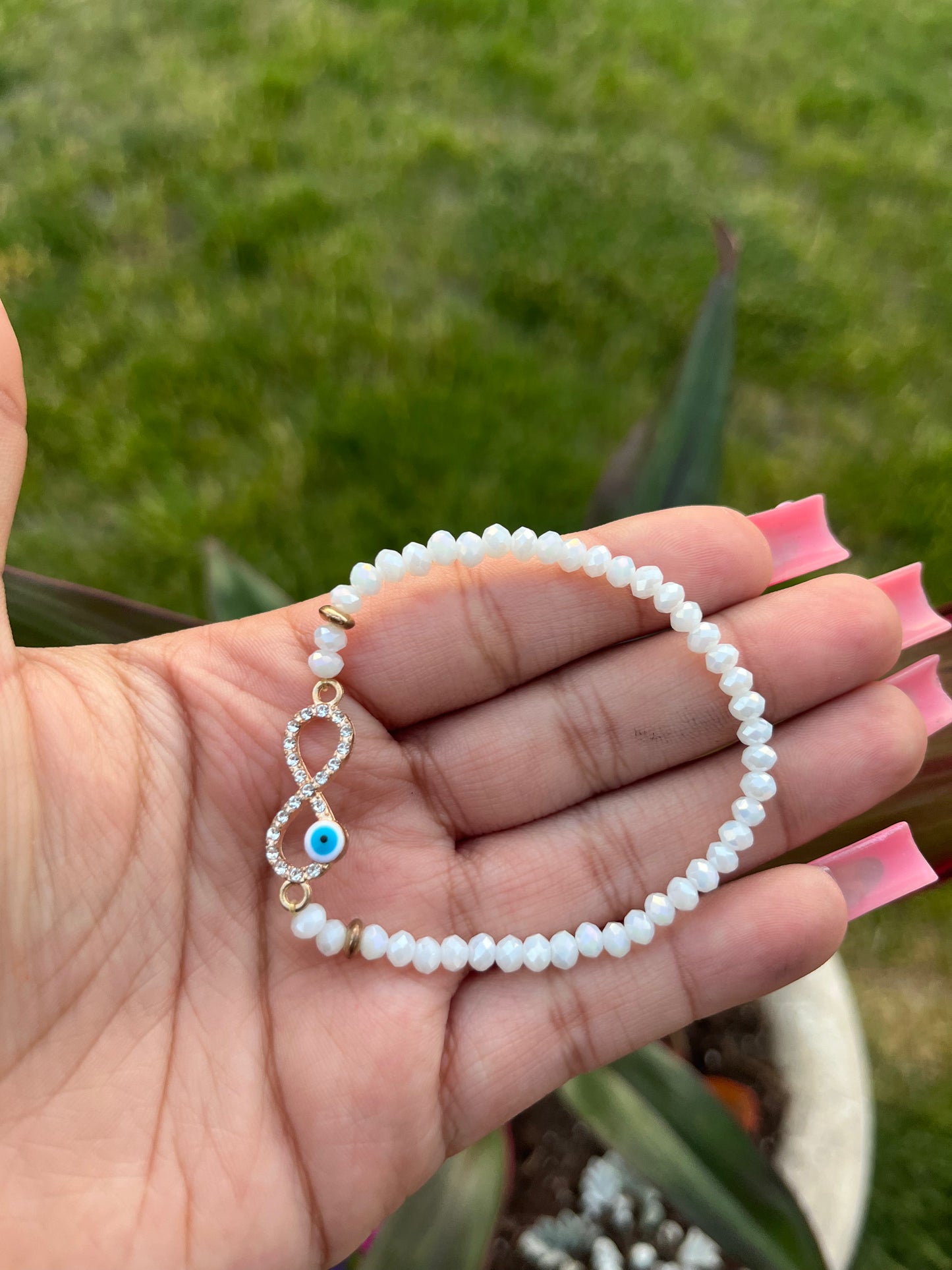 white infinity evil eye