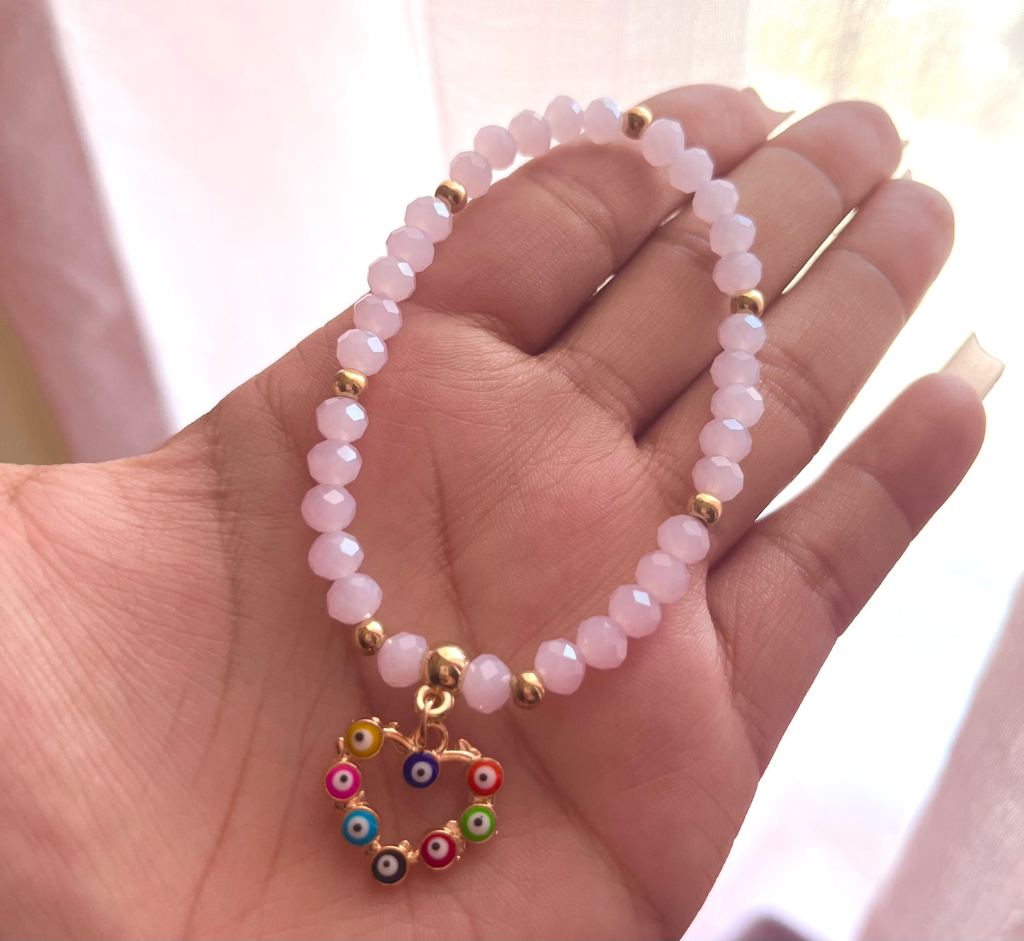pink heart evil eye bracelet