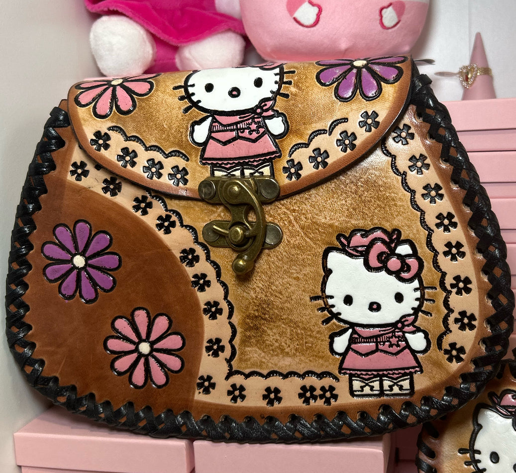 pretty cowgirl 🎀🐴 hello kitty leather cross body bag