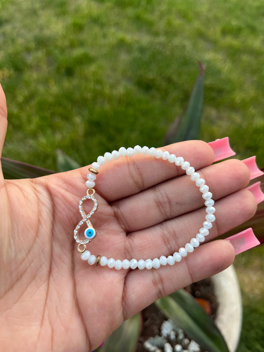 white infinity evil eye