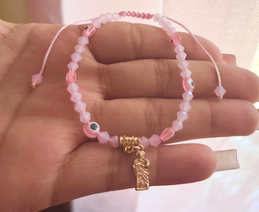 pink san judas adjustable bracelet